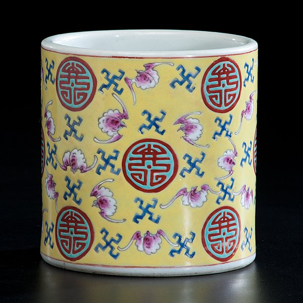 Chinese Famille Jaune Brush Pot : Chinese Famille Jaune Brush Pot Early 20th century. Porcelain brush pot having famille rose decoration of bats, wan, and shou characters in enamel on yellow ground, Guangxu mark on underside; ht. 