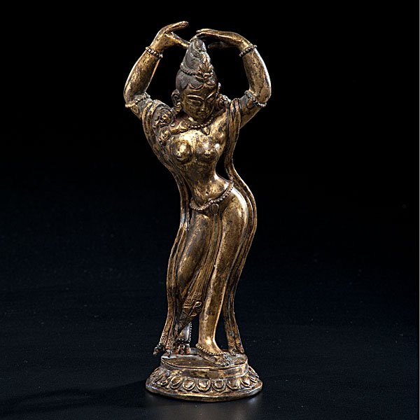 Nepalese Bronze Dakhini : Nepalese Bronze Dakhini 20th century. A gilt bronze Nepalese dancing dakhini atop lotus stand; ht. 9.25 in.