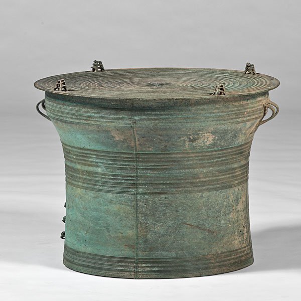 Southeast Asian Bronze Rain Drum : Southeast Asian Bronze Rain Drum Probably Thai or Burmese. A bronze rain drum with sunspot decoration and round sculptures of frogs; ht. 19.5, dia. 27 in.