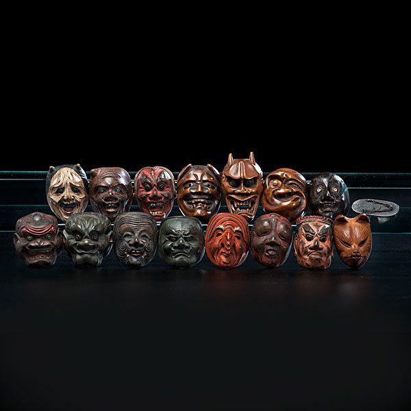 Fine Collection of Japanese Mask Items, Many with: Fine Collection of Japanese Mask Items, Many with Identified Carvers Collection of four mask netsuke, eleven miniature masks, and miniature sandal of silver; ht. of tallest 2.25 in. Housed in