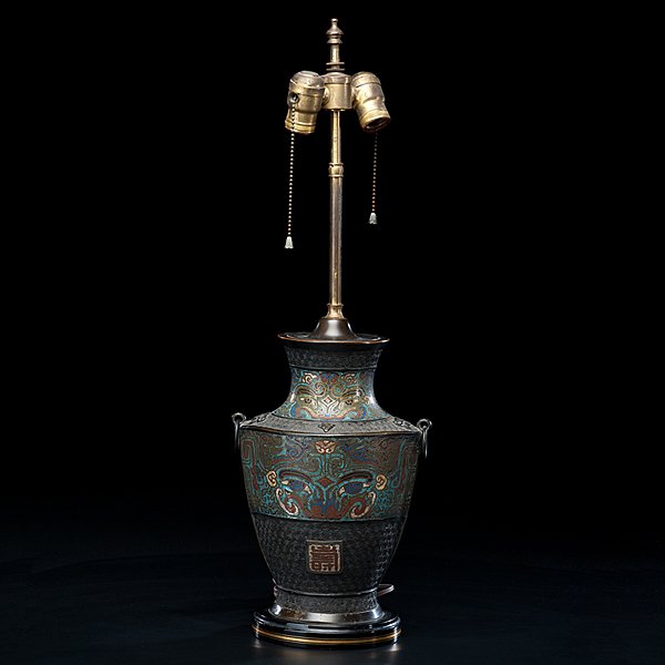 Japanese Champlevé Lamp : Japanese Champlevé Lamp Late 19th/early 20th century. A bronze vase converted to an electrical table lamp, having decoration of champlevé enamels, tao tieh masks and shou characters; ht. 14 in.