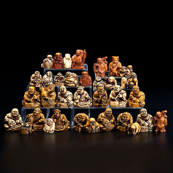 Collection of Japanese Netsuke : Collection of Japanese Netsuke 20th century. A collection of thirty six (36) resin or reproduction molded netsuke; tallest 2.5 in.
