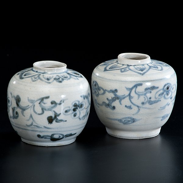 Vietnamese Blue and White Storage Jars : Vietnamese Blue and White Storage Jars 17th century. A pair of underglaze blue decorated storage jars with floral scrolling, from the Hoi An Hoard; ht. 3.5 in.