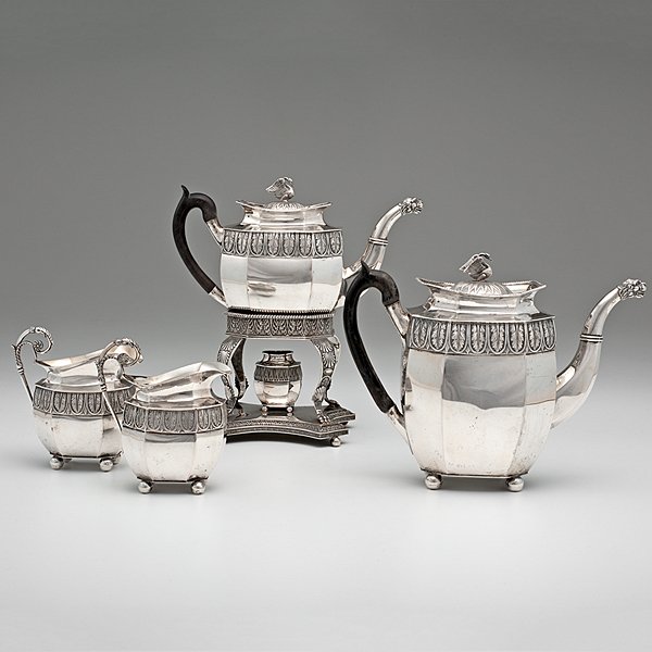 Silver Tea and Coffee Service : German, mid 19th century. A silver tea and coffee service with pelican finials, lion head spouts, acanthus border and ball feet. Marked for Hamburg silversmith Johann Heinrich Friedrich Voil. Include