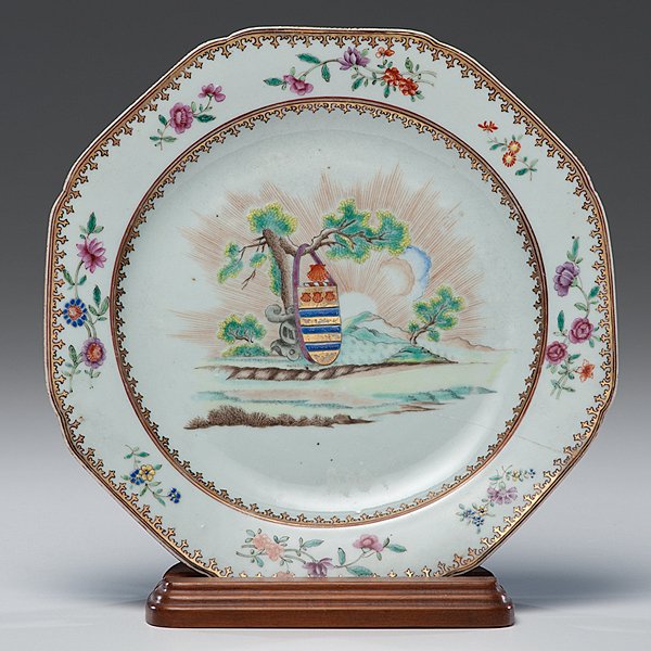Chinese Export Armorial Porcelain Plate : Chinese export, ca 1755. A porcelain famille rose octagonal plate, the arms of Clarke of Sandford centered within a spear border and with floral sprays to the rim, unmarked, lot includes wooden displa