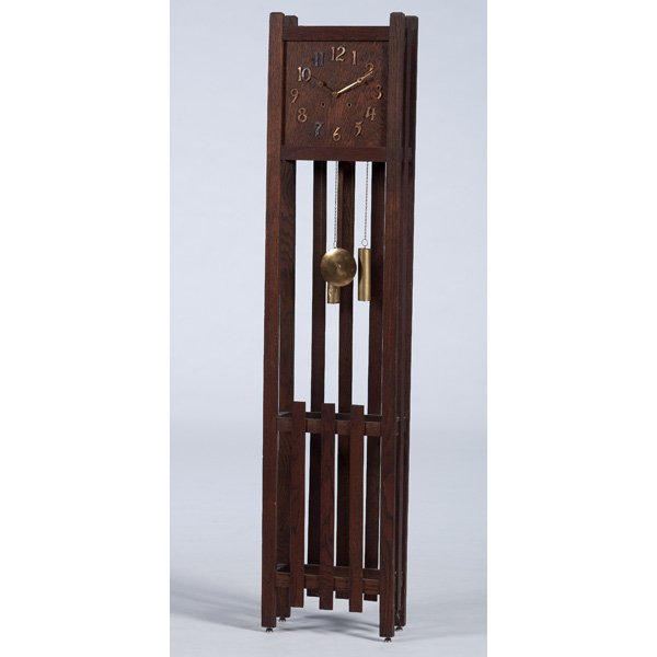 Mission-Style Tall Clock : Mission-Style Tall Clock American, 20th century. An oak Mission-style tall clock having an eight day time and strike, unmarked but probably by Sessions or New Haven; ht. 72.5 in.