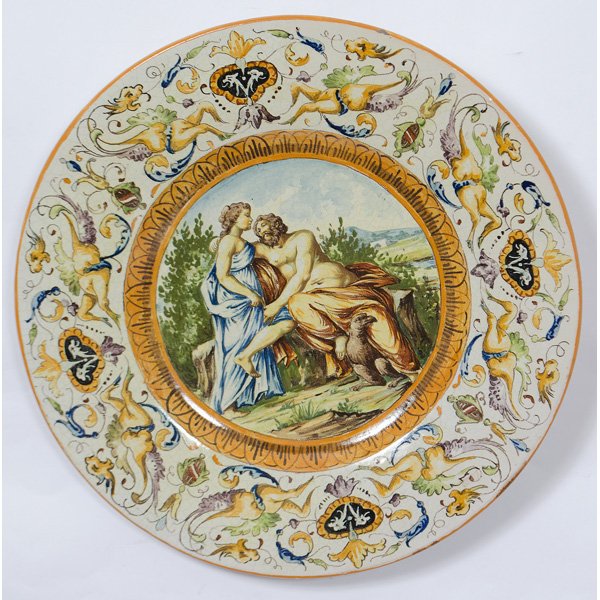 Continental Faience Charger : Continental Faience Charger Continental. A hand-painted faience charger with Baroque scenes, having a painted mark on bottom; dia. 17 in.