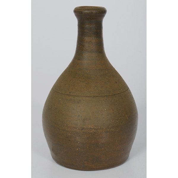 Southern Pottery Bottle : Southern Pottery Bottle American, 20th century. A simple southern pottery bottle with incised line border; ht. 7.75, wd. 5 in.