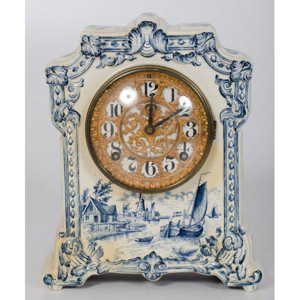 Ansonia Mantel Clock in Delft Case : Ansonia Mantel Clock in Delft Case American, ca 1900. An Ansonia mantle clock, eight-day time and strike, original brass filigree dial, delft-style porcelain case, impressed on back Pawnee; ht. 10.7