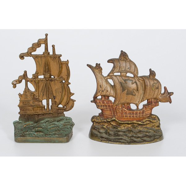 Sailing Ships Cast Iron And Bronze Doorstops : Sailing Ships Cast Iron And Bronze Doorstops American, a cast iron and painted Galleon ship by Creations co, marked 140F, ht 7.5 in.: AND galleon ship marked "225", and Seville Studios Copyr