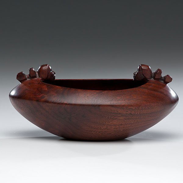 Bob Boomer (b.1944 ) Figural Wood Bowl : Bob Boomer (b.1944 ) Figural Wood Bowl black walnut wood with a woman's face on each end; signed and dated on base, length 10.75 in. x width 6.5 in. 1988