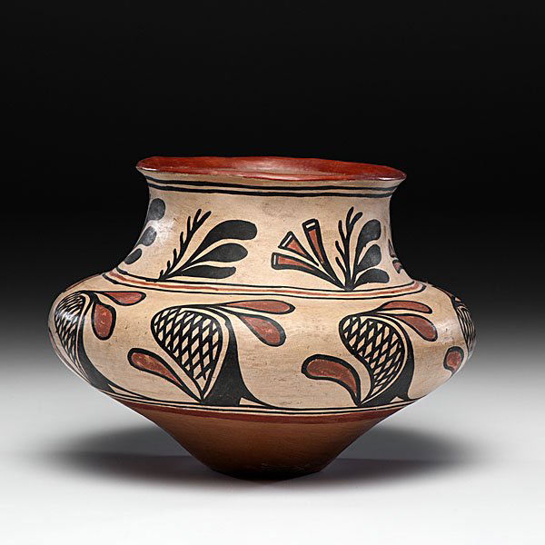 San Ildefonso Polychrome Jar From the Collection of Dr.: San Ildefonso Polychrome Jar From the Collection of Dr. Kent and Karen Vickery, Colorado beautifully potted with a wide, squat body, constricted neck, and slight outwardly flared rim; bold desert fl