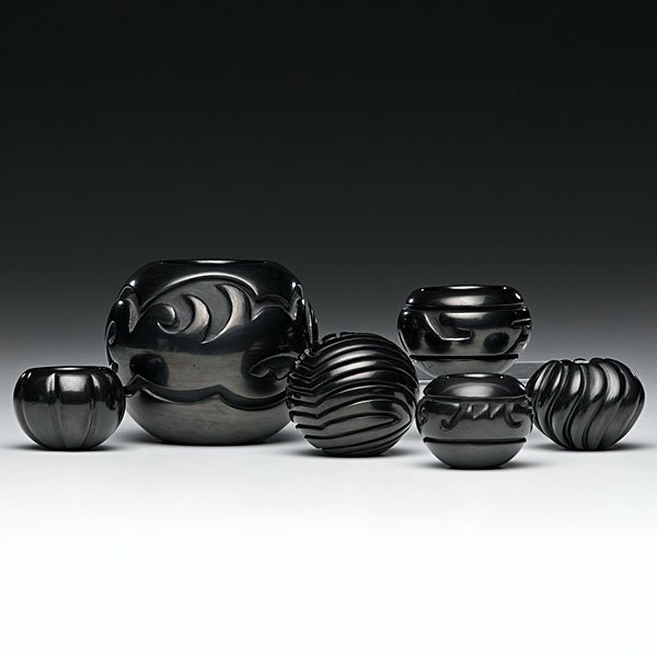 Linda Tafoya-Oyenque Santa Clara/San Juan Blackware Jar: Linda Tafoya-Oyenque Santa Clara/ San Juan Blackware Jars lot of 6 signed miniature pottery, all with various carved designs, sizes range from 3.25 in. x diameter 3.75 to height 1.5 in. x diameter 2