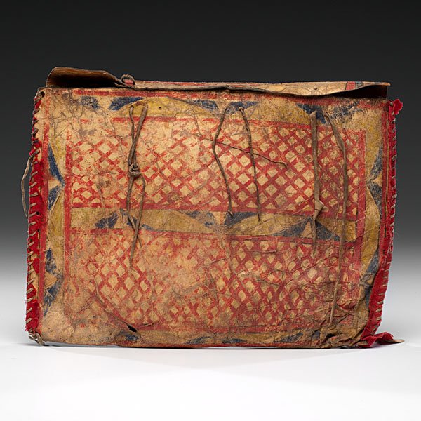 Sioux Painted Parfleche Envelope : Sioux Painted Parfleche Envelope sinew-sewn closing flap with hide lashings and red wool along edges; painted in red, yellow, blue, and green; old tag inside parfleche reads Sioux, near White River,