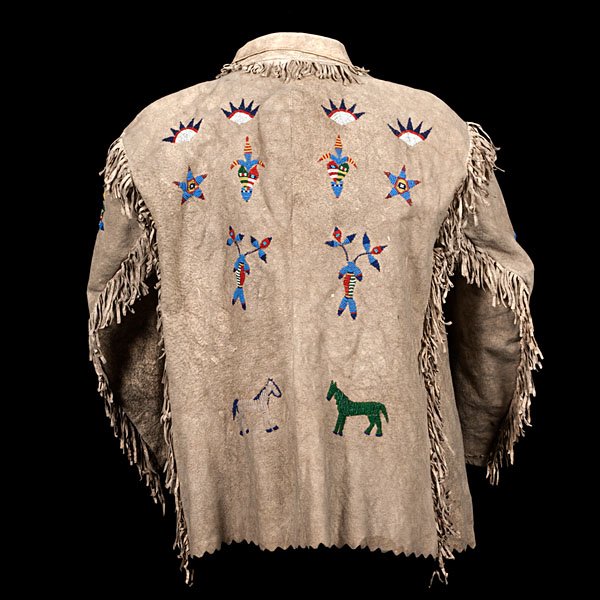Santee Sioux Beaded Hide Jacket : Santee Sioux Beaded Hide Jacket sinew-sewn and beaded using colors of medium and dark blue; red white-heart; translucent green; greasy yellow; and white; back decorated with horses and other floral 