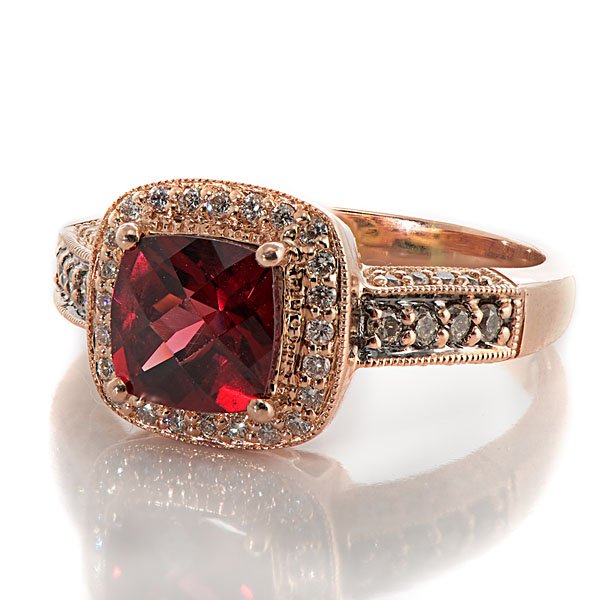 Ladies Levian 14k Rose Gold Garnet and Diamond Ring : Ladies Levian 14k Rose Gold Garnet and Diamond Ring Ladies Levian 14k rose gold fashion ring containing 8 Levian chocolate diamonds and 41 white diamonds weighing approximately one-third carat to