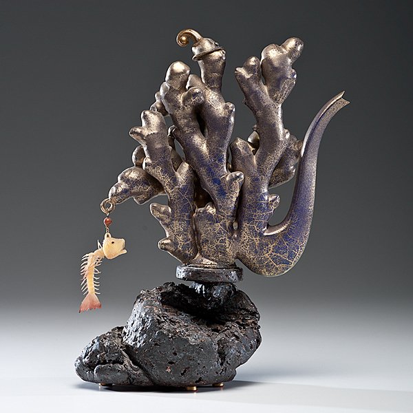 Adrian Saxe (1943; USA) : Untitled Ewer (A Trolling Drollgasm) 94-267 1994 Glazed porcelain with on-glaze luster, stoneware base and mixed media attachments: ht. 14, wd. 11 in.; signed on base and foot of bowl. This teapot'
