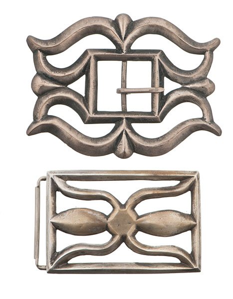 Navajo Tufa-Cast Buckles: lot of 2. Includes a curvilinear buckle with a square opening, length 3.5 in.; AND the other with a traditional image, length 2.75 in. mid-20th century Dr. Kent Vickery (1942 - 2011) grew up with pa