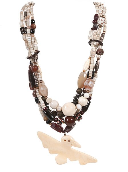 Robert Watson Kaniatobe (1936-1990) Choctaw Fetish Neck: entitled "A Lofty Experience" and designed by Kristen Kaniatobe. Necklace contains four strands of trade beads and a walrus ivory thunderbird fetish pendant. The antique glass trade beads, da