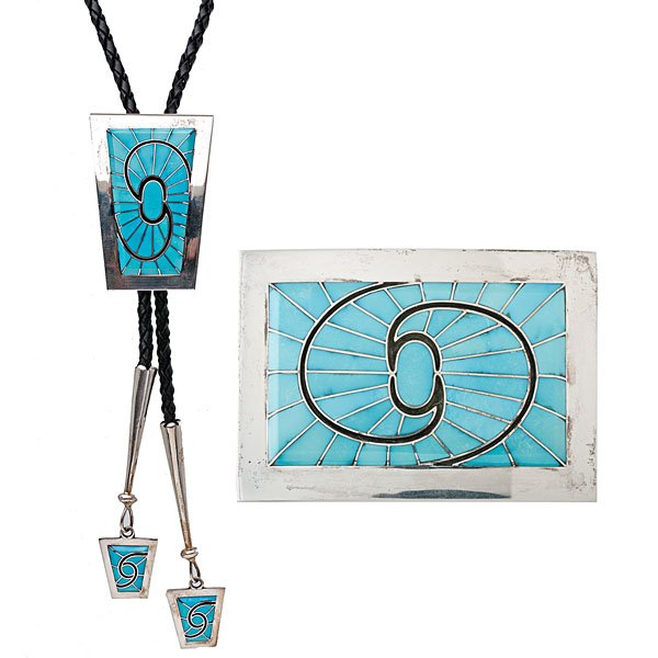 Dickie Quandelacy Zuni Silver and Turquoise Matching Bo: lot of 2. Each piece is signed D. Quandelacy with his hallmark. The buckle and bolo with matching tips are typical of the work for which he is famous: shaped stones set in a raised channel inlay s