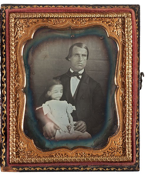 Postmortem Daguerreotype of Father Cradling Daughter: Postmortem Sixth Plate Daguerreotype of Father Cradling his Daughter A heartrending, sixth plate daguerreotype of a father, with a strained look on his face, cradling his young, deceased daughter, d