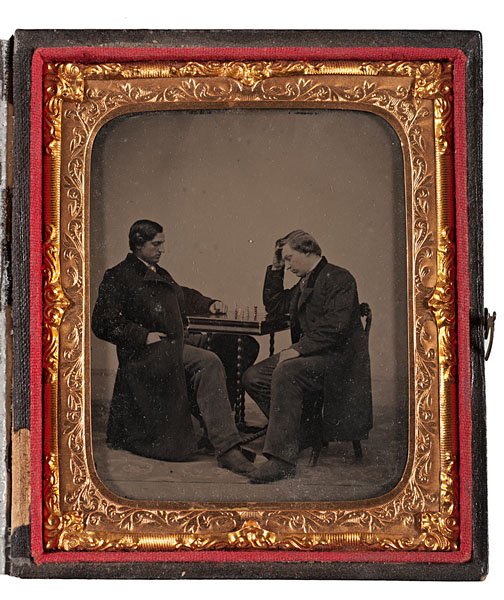Sixth Plate Ambrotype of Chess Players : Sixth Plate Ambrotype of Chess Players Sixth plate ambrotype of two men concentrating on a chess game on the table between them, with the pieces tinted gold. The gentleman at right appears rather fr