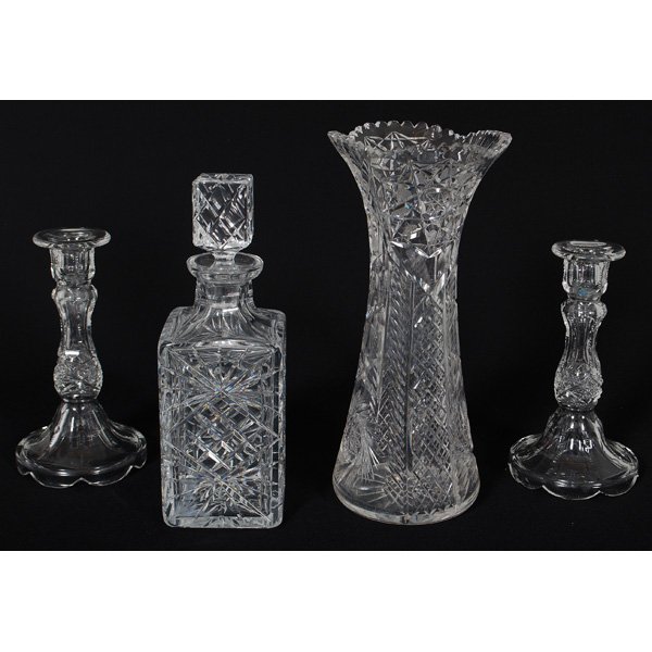 American Cut and Pressed Glass : American, 20th century. Four pieces of cut and pressed glass, including a pair of candlesticks etched Wright, a scalloped rim vase, and a cut and pressed decanter; vase ht. 12 in.