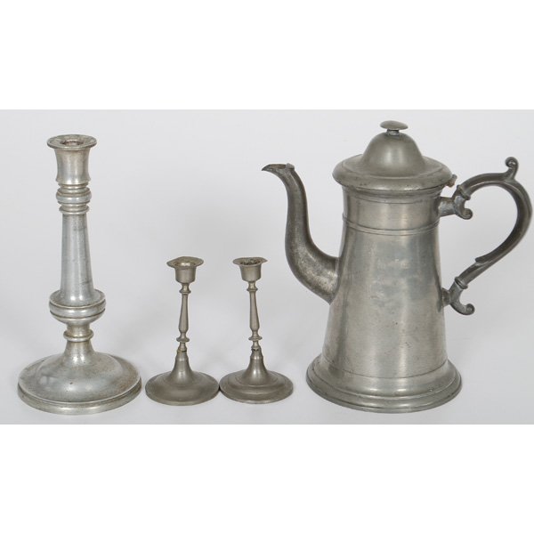 Isaac Lewis Coffee Pot, Plus : American, second-quarter 19th century. A lighthouse-form pewter coffee pot having a scrolled ear handle, marked I.C. Lewis for Isaac C. Lewis (Meriden, Connecticut), PLUS three pewter candlesticks, 