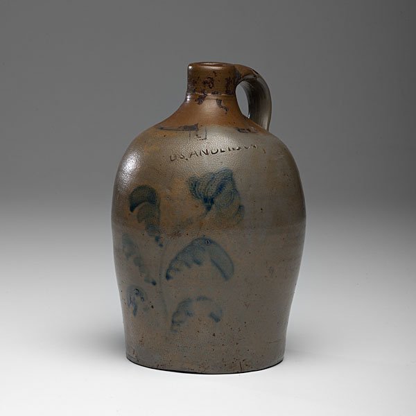 D S Anderson Stoneware Jug : American (Pennsylvania), 19th century, attributed to David Anderson. A rare one gallon salt glaze stoneware jug of ovoid form with applied handle and with cobalt floral decoration to front, having imp