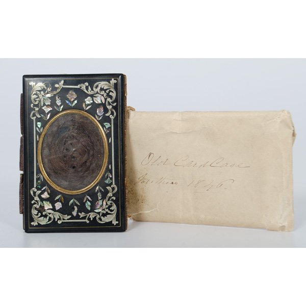 Mother-of-Pearl and Silver Card Case with Hair Locket : Ca 1840s. A card case and hair locketwith silver and mother-of-pearl inlay, accompanied by period envelope; 3.5 X 2.5 in.