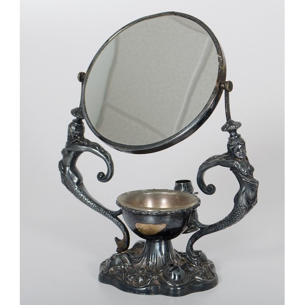 Silverplate Art Nouveau Figural Shaving Stand : American, late 19th-early 20th century. Apollo Silver Co. quadruple plated shaving stand in the Art Nouveau taste, having two mermaid supports for a round mirror, resting on a base with glass-fit bas