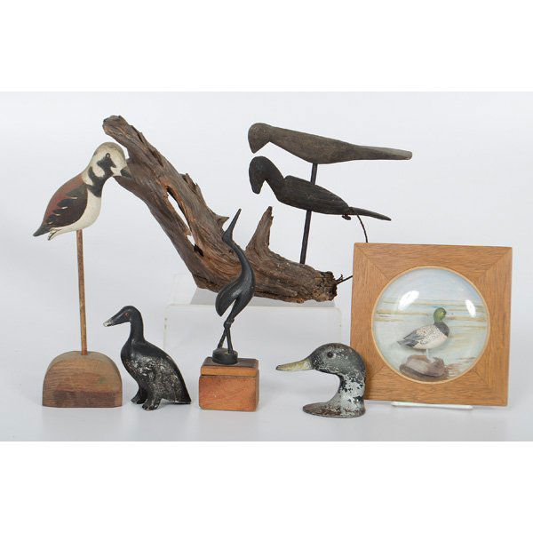 Modern Duck and Shorebird Displays : 20th century. Group of six duck and shorebird related objects, including cast metal duck head, crane on base, scaup or bluebill duck inside of shadowbox frame with painted landscape, two carved wooden