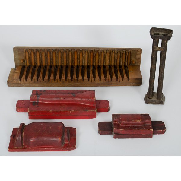 Cigar, Candle and Industrial Molds : American. A lot of molds for various objects. Group includes three red painted industrial molds, a four part candle mold, and a two piece wooden cigar mold manufactured by Miller, Dubrul & Peters Man