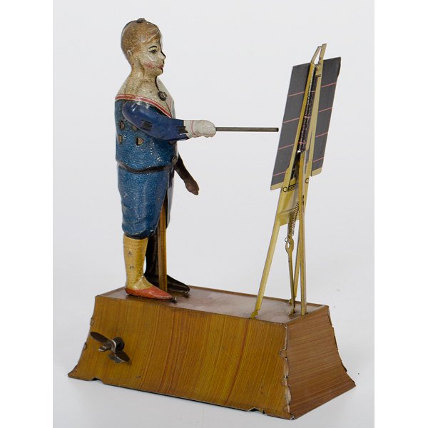 Tipp & Co. "Little Calculator" Mechanical Tin Toy : Germany, early 20th century. Tipp & Co. clockwork operated lithographed tin toy in the form of a school boy who moves his pointer around the chalkboard facing him, seemingly answering math problems.