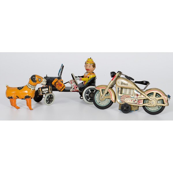 Marx & Venus Tin Toys : American, 20th century. Three lithographed tin toys, including Marx "Sandy" dog of Little Orphan Annie, Marx "Funny Flivver" car, and Venus tin friction powered motorcycle with rubber wheels; cycle ht