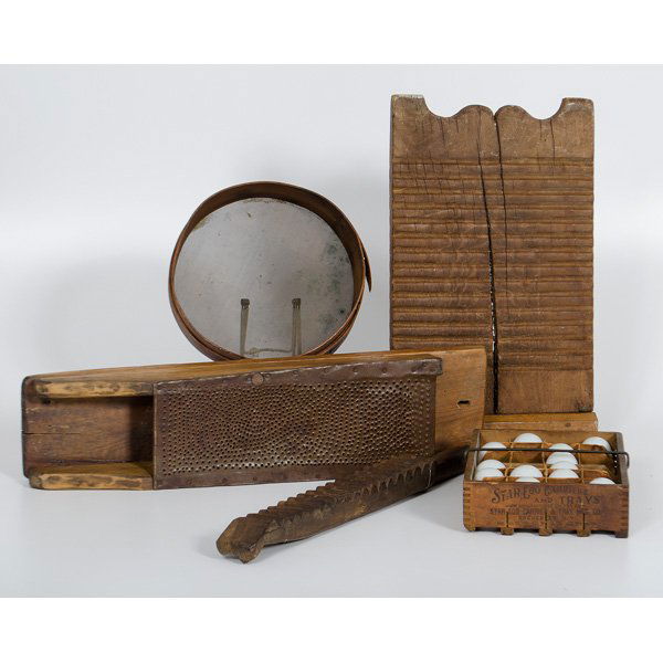 Treenware Accessories and Kitchen Utensils : An assembled group of five treenware accessories and kitchen utensils including an egg carrier by Star Egg Carriers of Rochester, New York, two washboards, a sifter and a grater; grater lg. 26.5 in. �