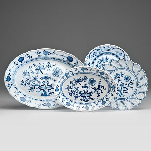 Meissen Blue Onion Serving Pieces : German, 20th century. Four Meissen serving dishes in the Blue Onion pattern, including one cake plate with molded geometric pattern, and two oval trays of graduated size, all with crossed sword mark.
