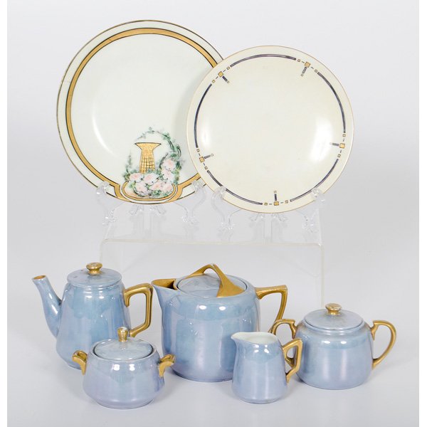 Limoges Child's Tea Set, Plus : Continental, 20th century. A three-piece child's tea set in the Aluminite Frugier pattern, marked Limoges / France, PLUS an additional pot and lidded sugar in a similar pattern, the pot unmarked an