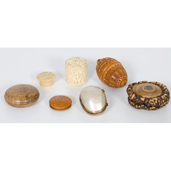 Assorted Snuff Boxes : An assortment of seven snuff boxes, one tortoise shell, one carved ivory, one mother of pearl, one carved bone, one carved nut shell, and two of wood; largest ht. 3 in.