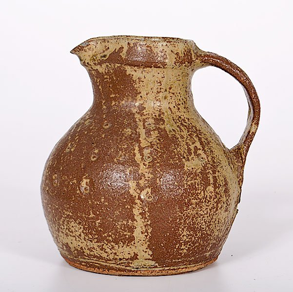 William Marshall (1923-2007, Britain): William Marshall (1923-2007, Britain) Stoneware Pitcher ht. 7, dia. 5.5 inches Artist stamp on foot under handle Impressed "St. Ives" mark and "WM" mark for William Marshall.