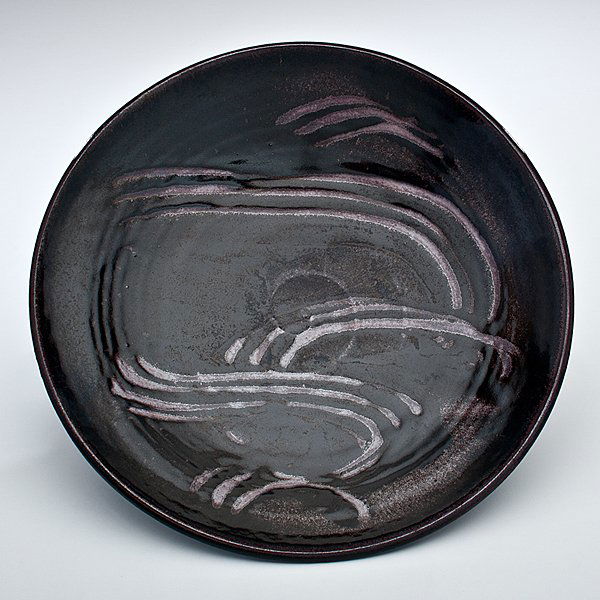 Warren MacKenzie (1924, USA) : Warren MacKenzie (1924, USA) Large Tenmoku Platter with Finger Combing, 1979 Stoneware ht. 3.5, dia. 15 inches A handsome platter done in tenmoku glaze with finger decoration. Provenance: Dani