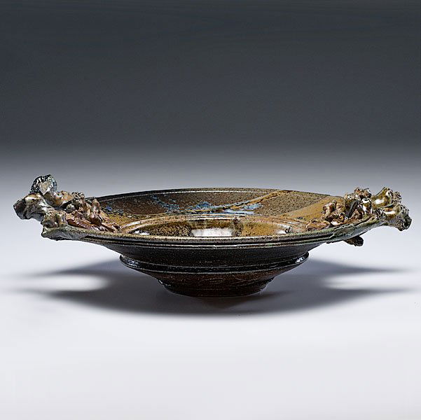 Don Reitz (1929, USA) : Don Reitz (1929, USA) Soup Bowl Stoneware ht. 2.75, wd. 14 inches Incised signature on base Don Reitz is recognized as one of the most important and influential ceramic artists of this century. �