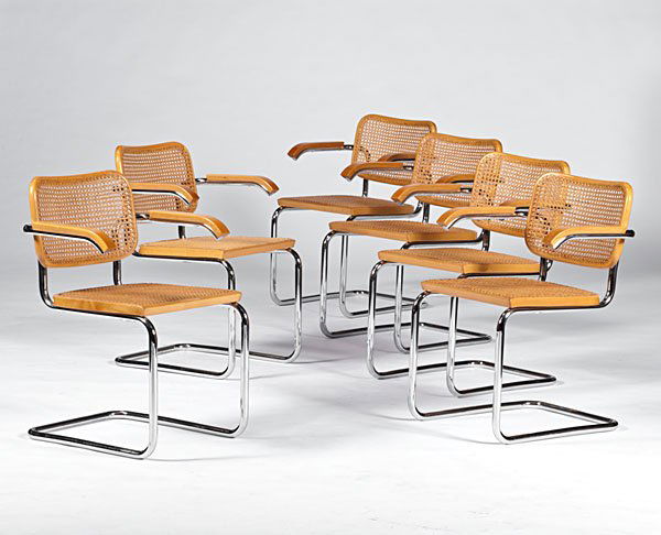 Breuer Armchairs, Set of Six : American, ca 1970s. A group of six Knoll Breuer's chairs with hardwood frames, caned seats and backs, supported by chrome bases; oah. 30.75