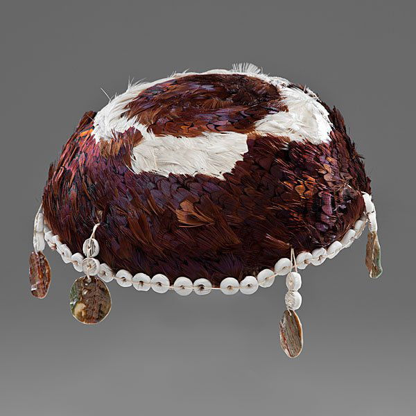 Pomo Gift Basket From the Collection of Dr. Kent and: with shell disks stitched around upper rim and same shells finished with abalone discs suspended at sides, height 3 in. x diameter 7.25 in. mid-20th century Dr. Kent Vickery (1942 - 2011) grew up wi