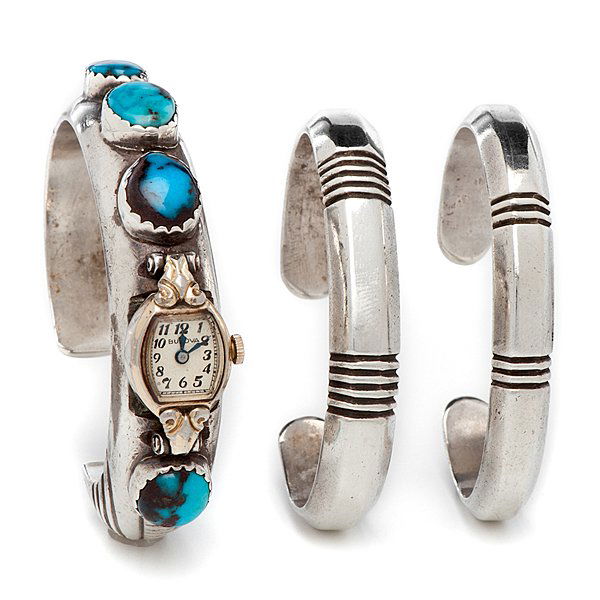 Joe H. Quintana (Cochiti, 1915-1991) Silver Watchband: lot of 3, including a silver band with four Bisbee turquoise cabochons and woman's Bulova watch, width 3 in., gap .75 in.; AND two deeply incised silver cuffs, each length 3 in., gap .75 in. Watchban
