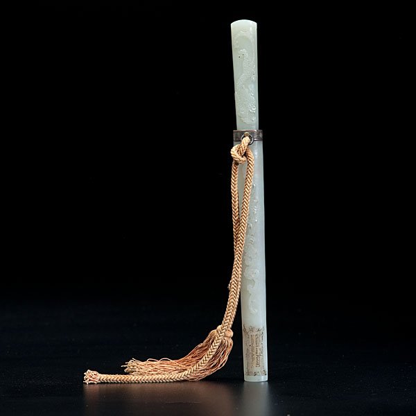 Chinese Qianlong Jade Mounted Knife : Chinese, 18th century. A Qianlong pale celadon jade mounted knife, carved in relief with dragons, chihlong, and foliate scrolling, containing a single edged blade in silver gilt mount; lg. 10.25 in. E