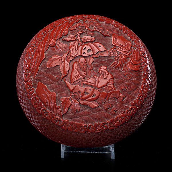 Chinese Cinnabar Wedding Box : Chinese, 19th century. A richly and deeply carved wedding box depicting a pair of scholars, heavily lacquered to the inside; dia. 7 in.