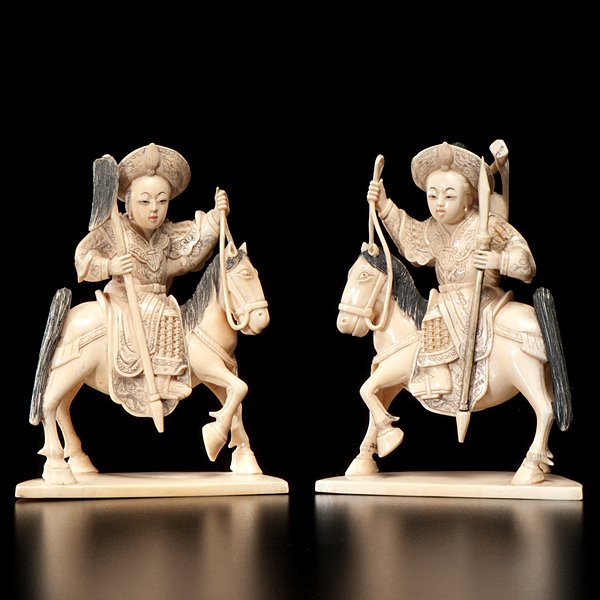 Pair of Chinese Carved Ivory Warriors on Horseback : Chinese. A pair of carved and inked ivory warriors; ht. of each 6 in.