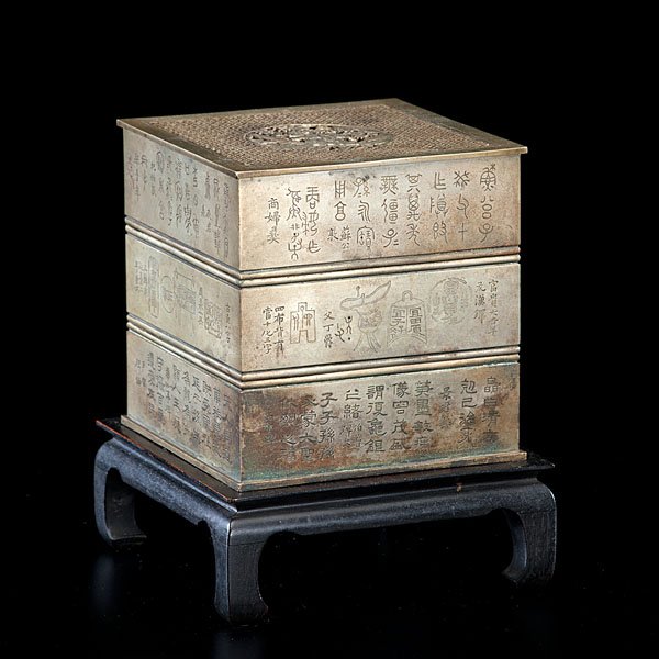Large Square Paktong Chinese Incense Clock : Late 19th century. Paktong incense clock, cover depicting monk and child, with sides engraved, and marked for Han Gee; oah 8 in. Contains six pieces plus the stand.