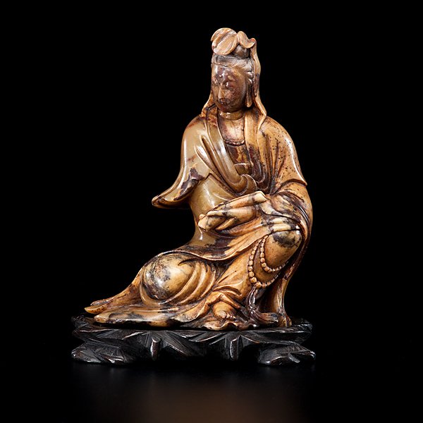 Chinese Soapstone Guanyin : Chinese, early 20th century. A well carved soapstone Guanyin, seated holding scroll on base; ht. 6 in.